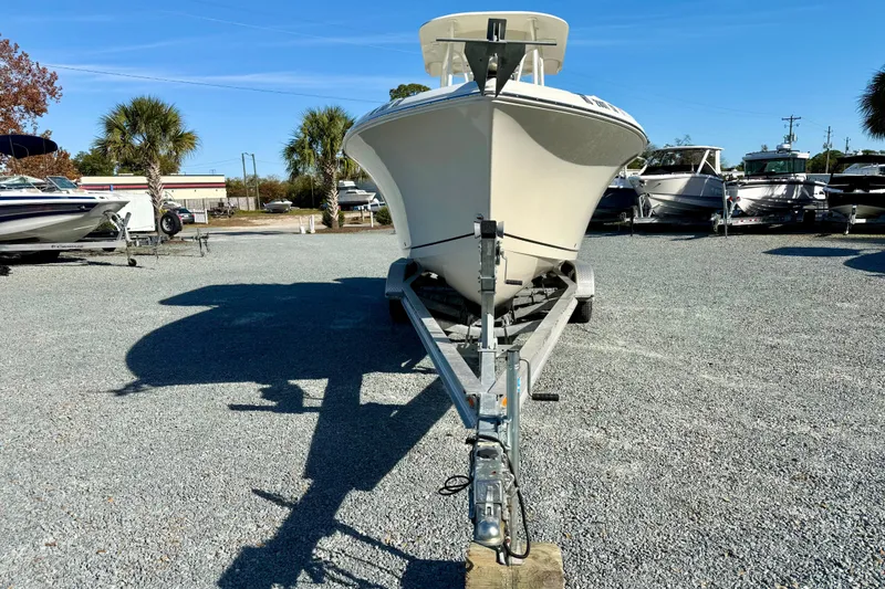 Slide: The Image of 2016 Sailfish 240 CC boat on trailer in sunny outdoor lot. - 39