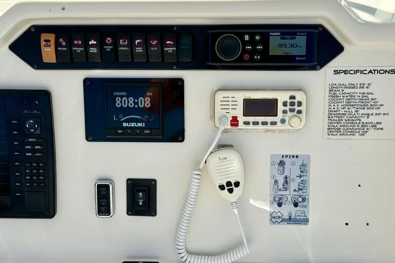 Slide: The Image of Control panel of a 2016 Sailfish 240 CC boat with specifications and equipment. - 53