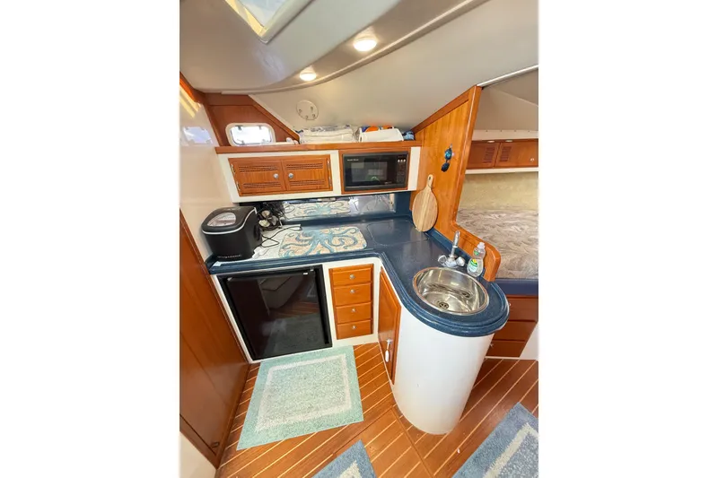 Slide: The Image of Interior view of Cabo 35 yacht kitchen, 1996 model. - 38