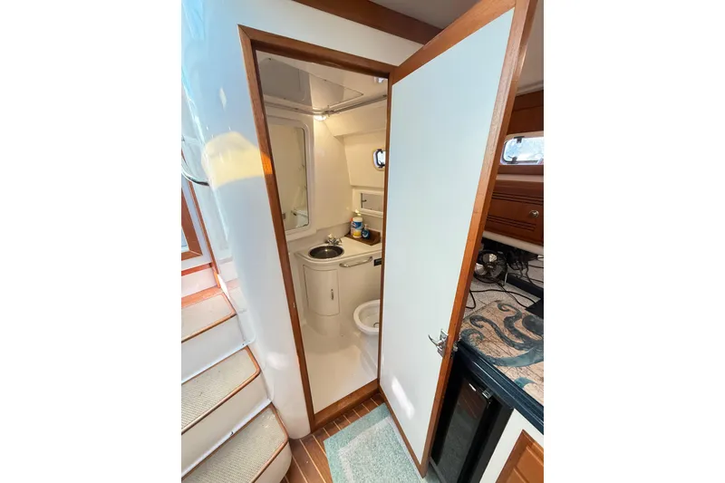 Slide: The Image of Interior view of a 1996 Cabo 35 yacht bathroom. - 41