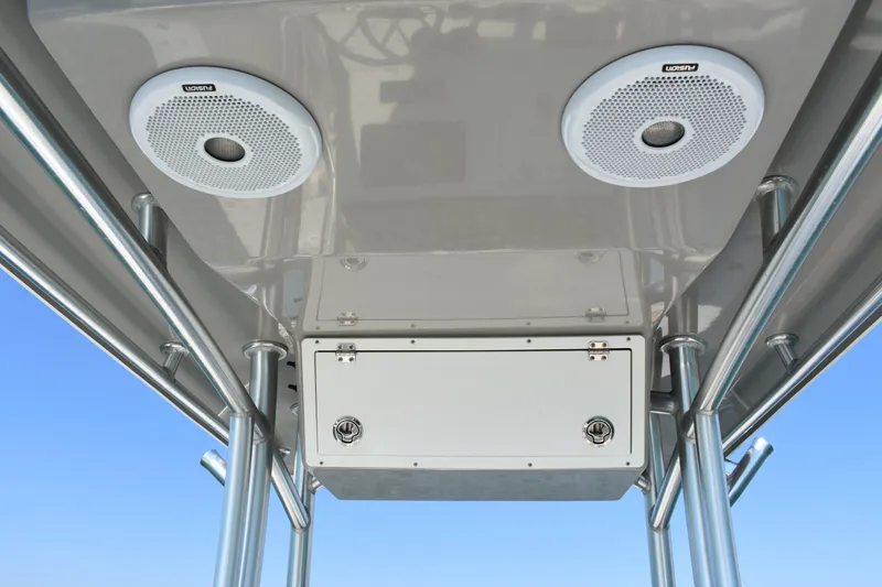 Slide: The Image of 2017 Bay Rider 2260 FS Skiff T-top with speakers and storage compartment. - 13