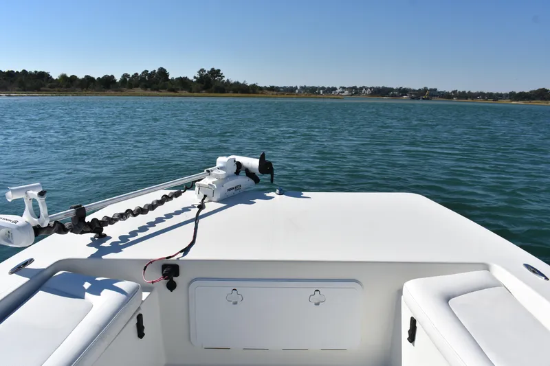 Slide: The Image of 2017 Bay Rider 2260 FS Skiff on calm water with clear sky. - 6