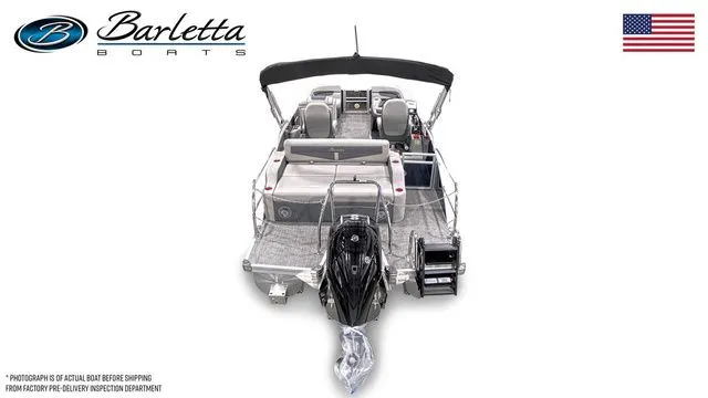 Slide: The Image of 2025 Barletta Boats Cabrio C22UC pontoon with motor, rear view, American flag. - 6
