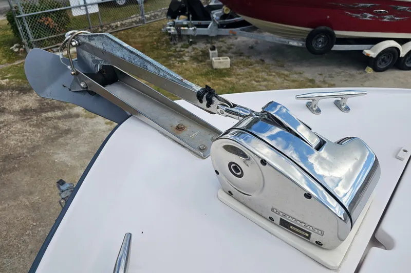 Slide: The Image of Anchor windlass on 2003 Grady-White Bimini 306 boat, with stainless steel finish. - 11