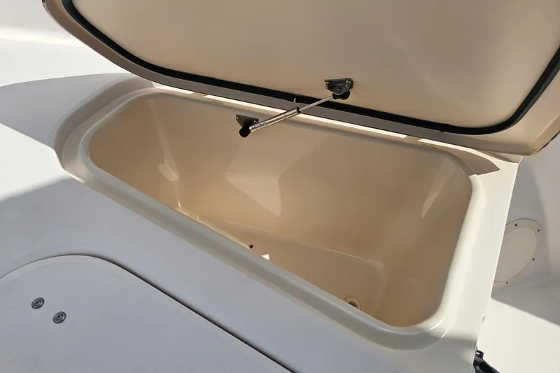 Slide: The Image of Open storage compartment on 2003 Grady-White Bimini 306 boat. - 16