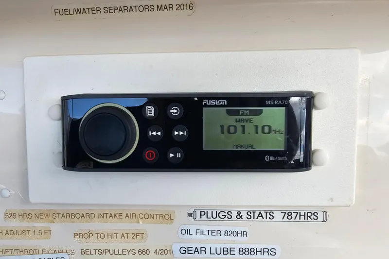 Slide: The Image of Fusion MS-RA70 radio on 2003 Grady-White Bimini 306 boat dashboard, tuned to 101.10 FM. - 33