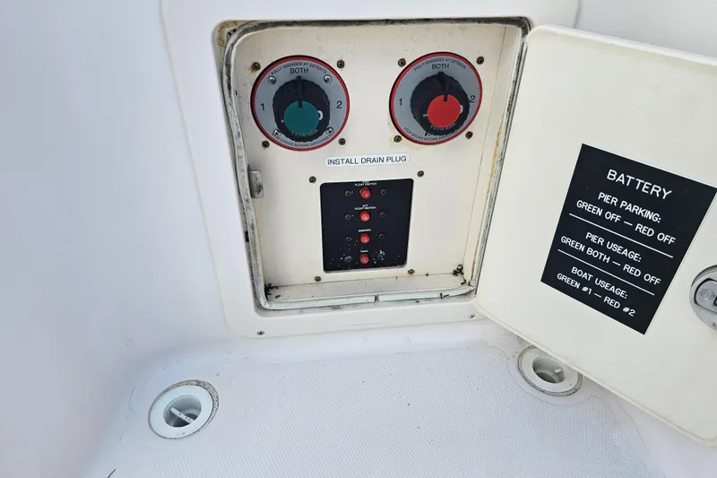 Slide: The Image of Battery control panel on a 2003 Grady-White Bimini 306 boat. - 38