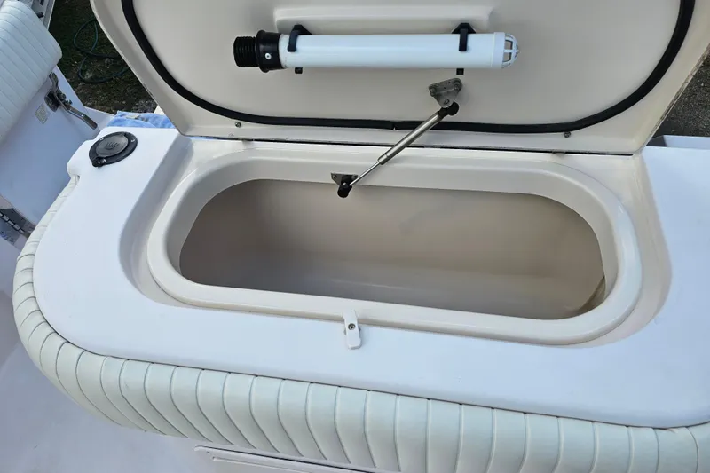 Slide: The Image of Open storage compartment on a 2003 Grady-White Bimini 306 boat. - 39