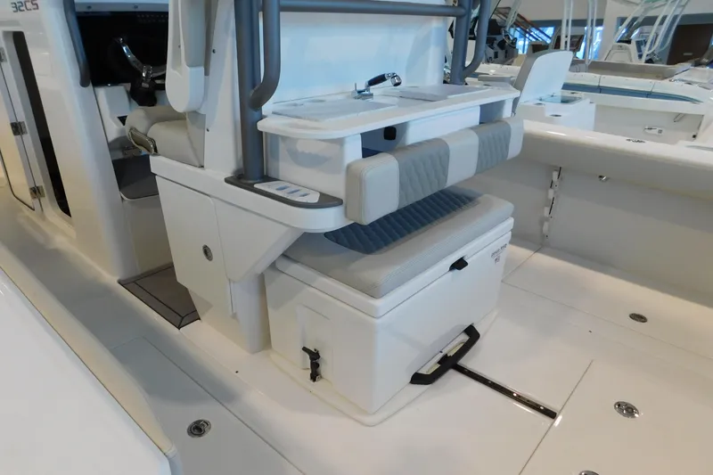 Slide: The Image of 2025 Solace 32 CS boat interior with seating and storage features. - 5