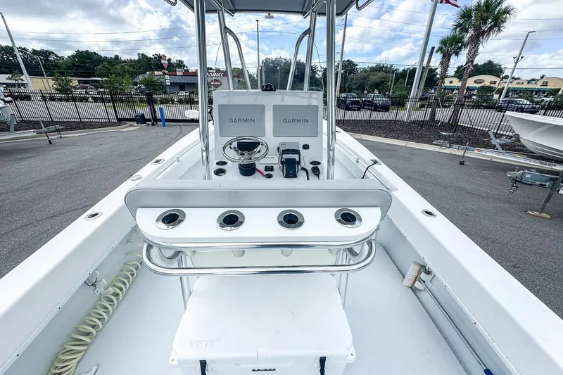 Slide: The Image of 2025 Contender 25 Tournament boat with Garmin electronics, sleek design, and spacious deck. - 6