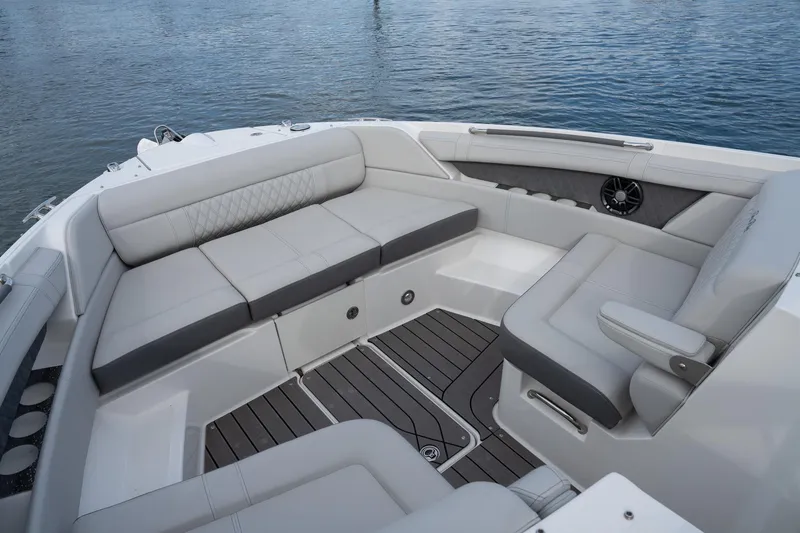 Slide: The Image of 2022 Sea Ray SLX 350 Outboard boat interior with luxurious seating and elegant design. - 25