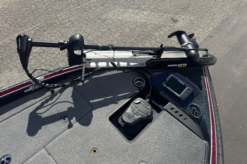 Slide: The Image of 2016 Triton 179 TrX boat deck with Minn Kota Fortrex trolling motor and Lowrance fish finder. - 11