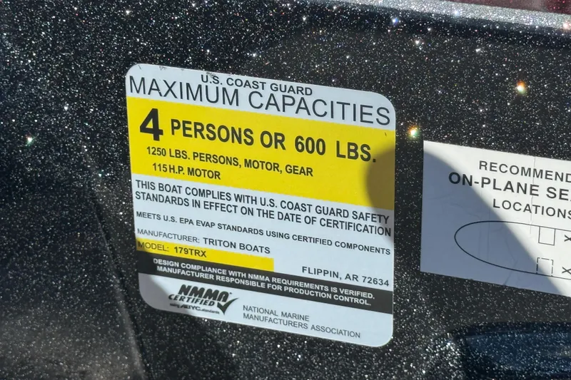 Slide: The Image of 2016 Triton 179 TrX capacity label: 4 persons or 600 lbs, 115 HP motor. - 15