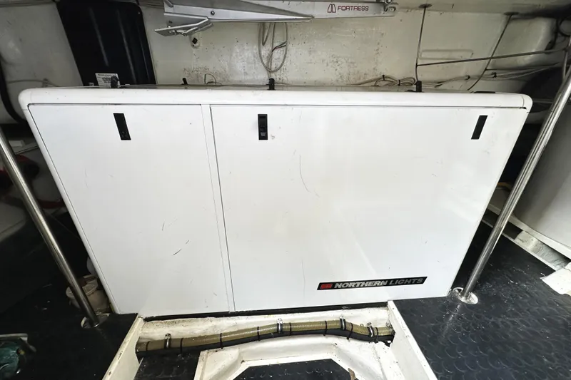 Slide: The Image of Engine room of 2004 McKinna 57 PHMY Widebody with Northern Lights generator. - 102