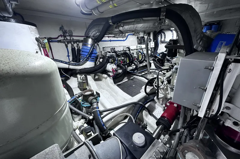 Slide: The Image of Engine room of a 2004 McKinna 57 PHMY Widebody yacht with stabilization systems. - 108