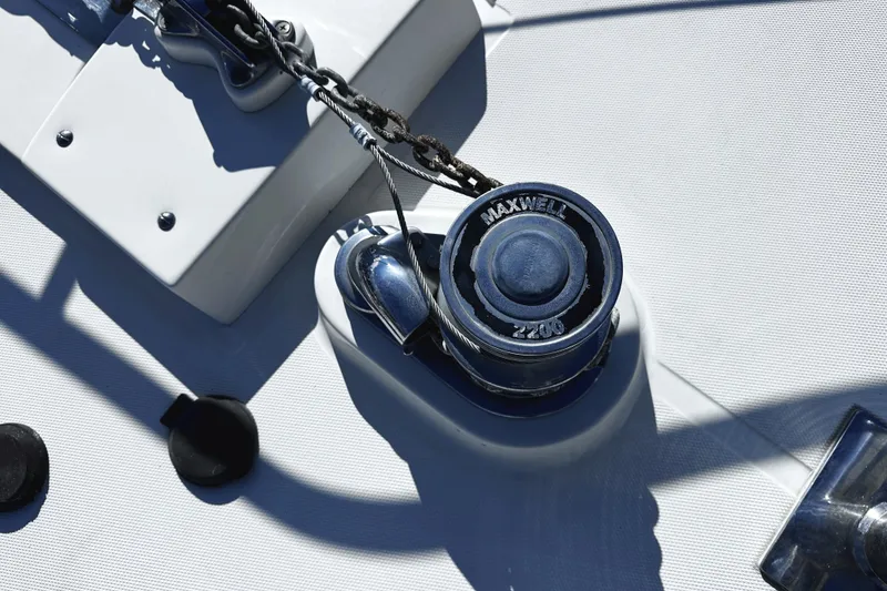 Slide: The Image of Anchor winch on 2004 McKinna 57 PHMY Widebody yacht deck. - 118