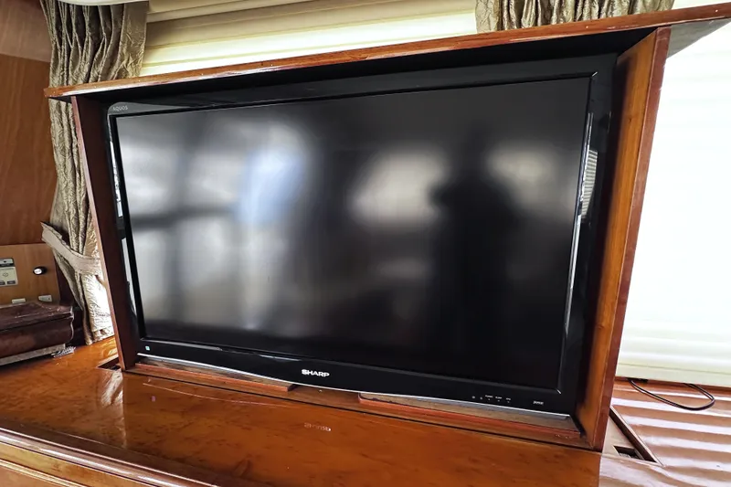 Slide: The Image of Sharp TV in wooden cabinet on 2004 McKinna 57 PHMY yacht. - 31