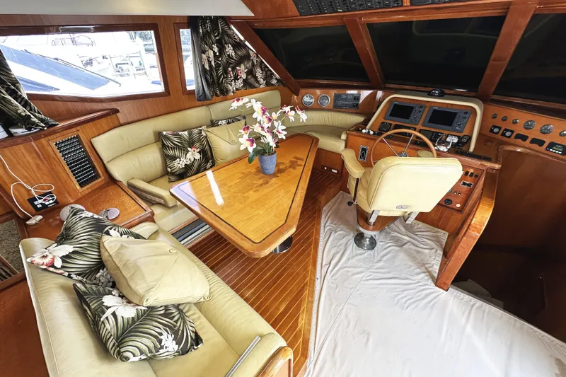 Slide: The Image of Luxurious interior of 2004 McKinna 57 PHMY yacht with elegant seating and helm. - 45