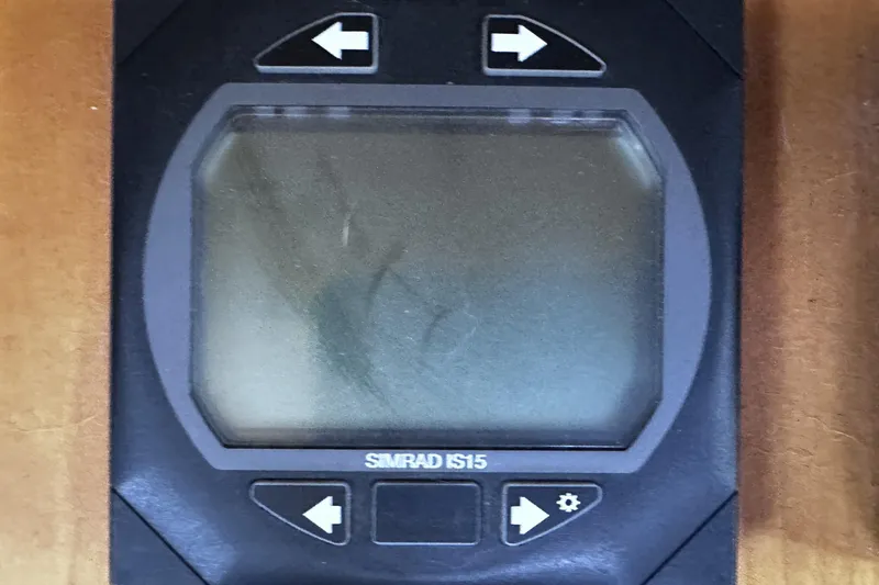 Slide: The Image of Simrad IS15 marine display on 2004 McKinna 57 PHMY Widebody yacht. - 54