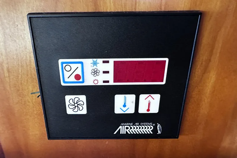 Slide: The Image of Marine air systems control panel on 2004 McKinna 57 PHMY Widebody yacht. - 69