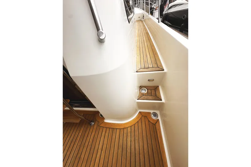 Slide: The Image of Teak deck walkway on 2004 McKinna 57 PHMY Widebody yacht with stabilization. - 9