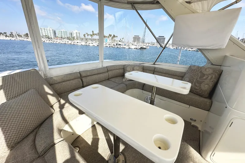 Slide: The Image of Luxurious seating area on 2004 McKinna 57 PHMY yacht with ocean view. - 94