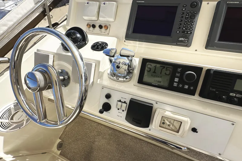 Slide: The Image of Control panel of a 2004 McKinna 57 PHMY Widebody yacht with stabilization features. - 96