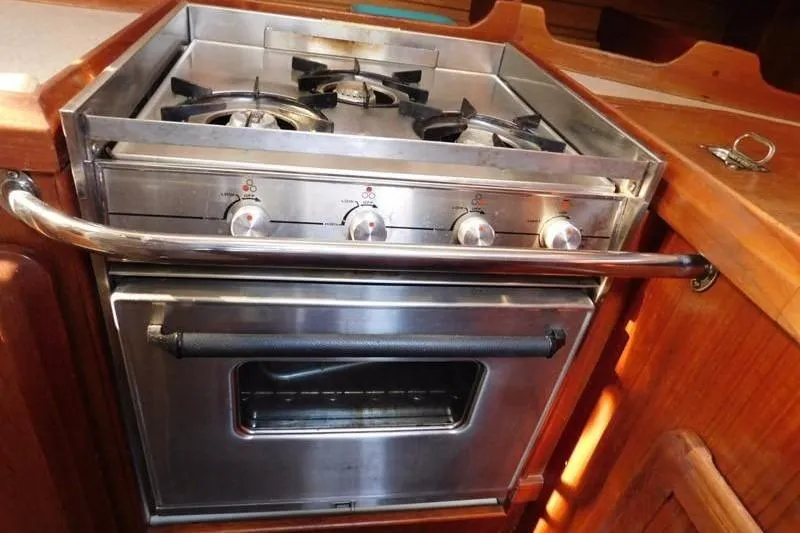 Slide: The Image of Stainless steel stove and oven in 1994 Hunter Passage 42 yacht kitchen. - 15