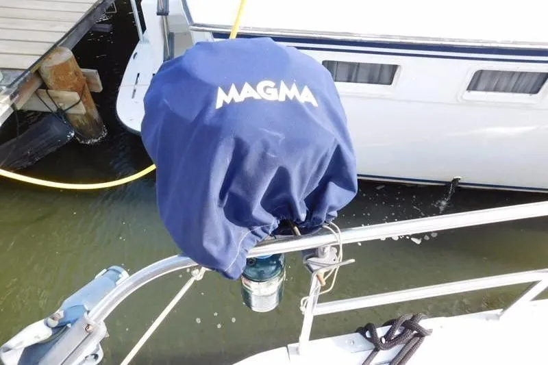 Slide: The Image of Blue Magma grill cover on 1994 Hunter Passage 42 sailboat deck. - 5