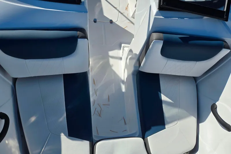 Slide: The Image of 2023 Tahoe 185 S boat interior with white and blue seating. - 18