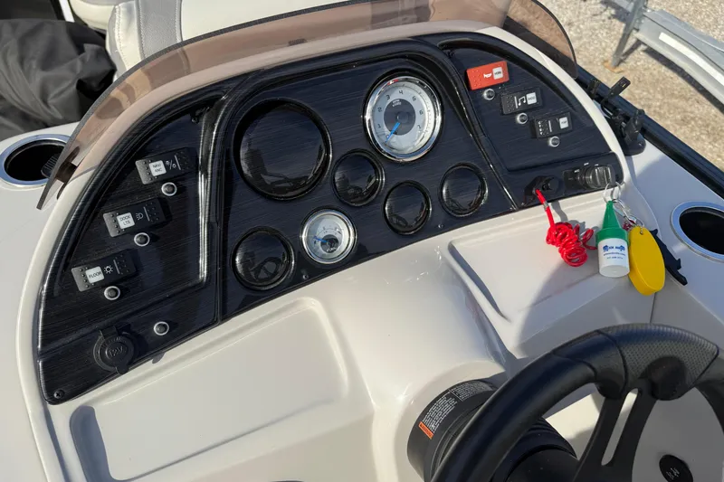 Slide: The Image of Dashboard of 2020 SunChaser Geneva Sport 22 LR DH boat with gauges and controls. - 10
