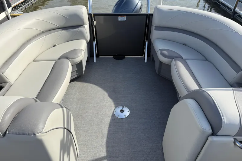 Slide: The Image of 2020 SunChaser Geneva Sport 22 LR DH pontoon boat interior with plush seating. - 14