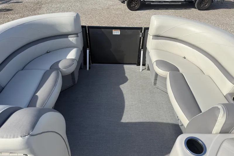 Slide: The Image of 2020 SunChaser Geneva Sport 22 LR DH pontoon boat interior with gray seating and flooring. - 15
