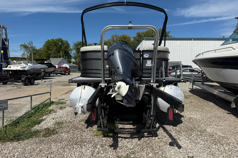 Slide: The Image of 2020 SunChaser Geneva Sport 22 LR DH pontoon boat on trailer, rear view. - 16
