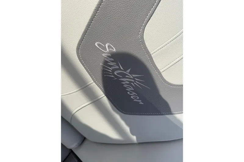 Slide: The Image of SunChaser Geneva Sport 22 LR DH 2020 boat seat with logo detail. - 5