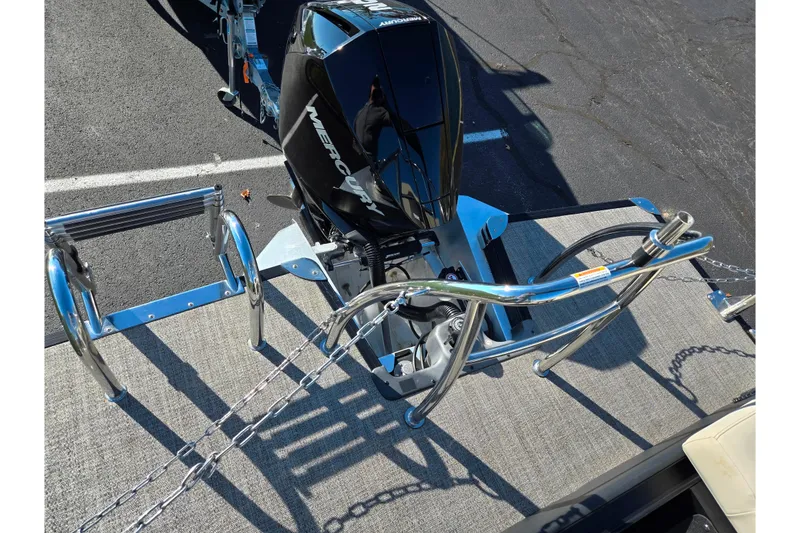 Slide: The Image of 2021 Barletta C24UC boat with Mercury engine and stainless steel railings. - 16