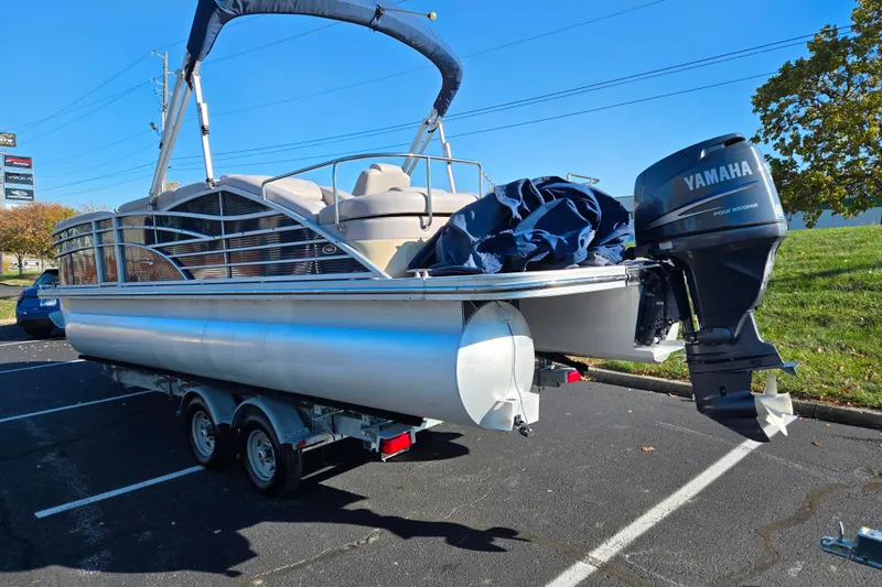 Slide: The Image of 2011 Bennington 2275RCW OB pontoon boat with Yamaha outboard motor on trailer. - 3