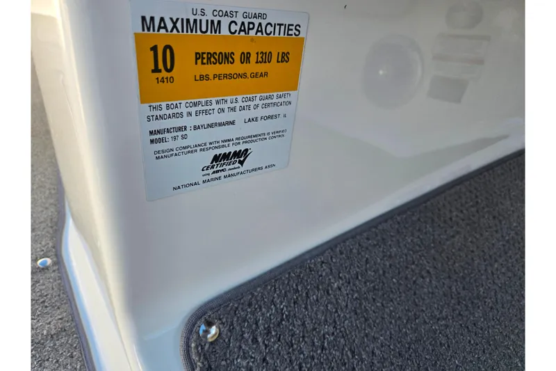 Slide: The Image of 2011 Bayliner 197 boat capacity label, maximum 10 persons or 1310 lbs. - 12