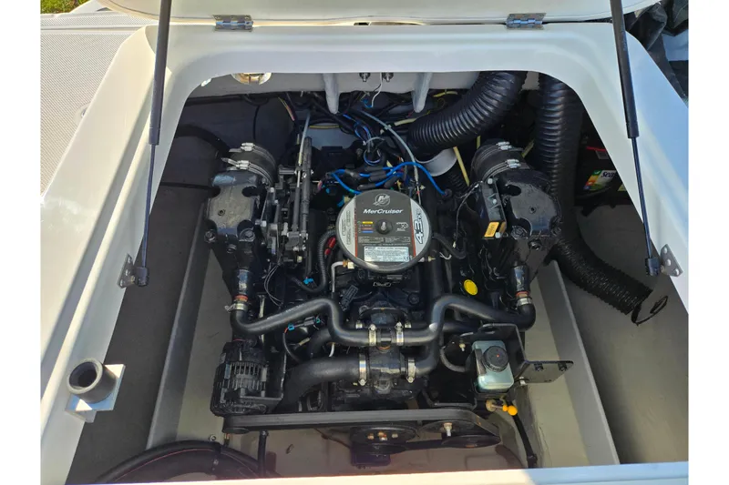 Slide: The Image of 2011 Bayliner 197 boat engine compartment with MerCruiser 4.3L engine. - 21
