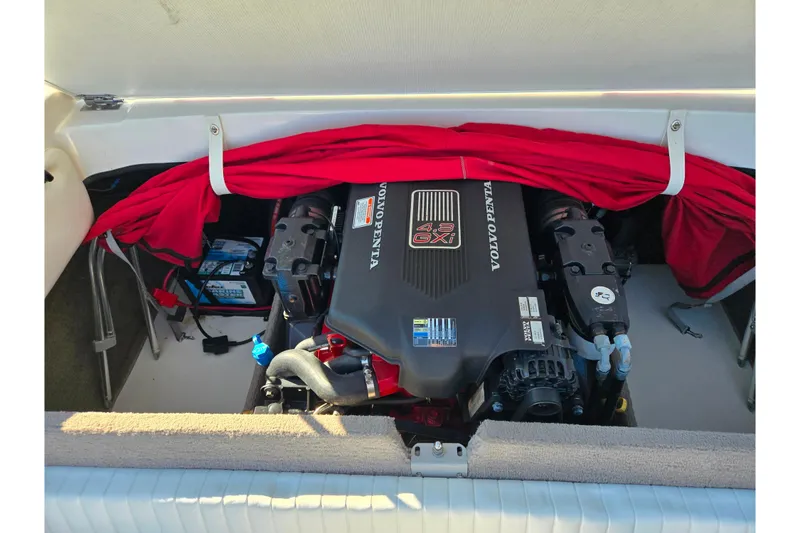 Slide: The Image of 2005 Stingray 195 LR boat engine compartment with Volvo Penta 4.3 GXI engine. - 23