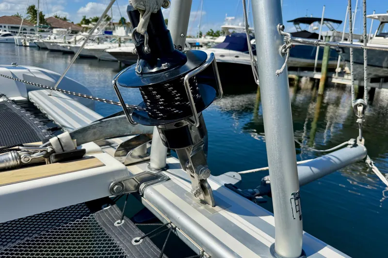 Slide: The Image of Close-up of a 2020 Lagoon 42 sailboat's rigging at a marina. - 3
