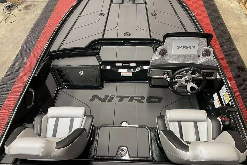 Slide: The Image of 2026 Nitro Z20 XL Pro boat interior with Garmin system and dual seats. - 7