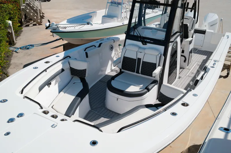 Slide: The Image of 2021 Tidewater 292 CC Adventure boat with sleek seating and modern design. - 12
