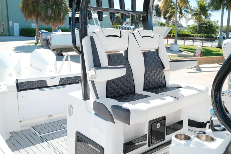 Slide: The Image of 2021 Tidewater 292 CC Adventure boat with luxurious seating and modern design. - 15