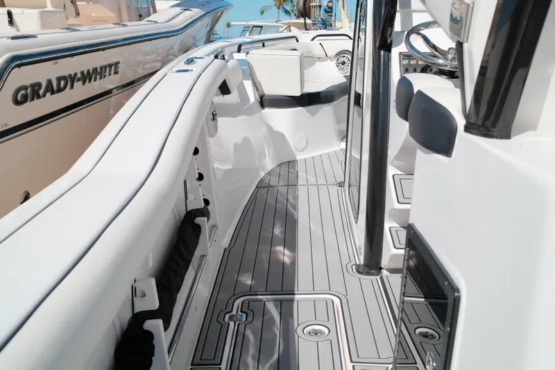 Slide: The Image of 2021 Tidewater 292 CC Adventure boat interior with sleek design and modern features. - 18