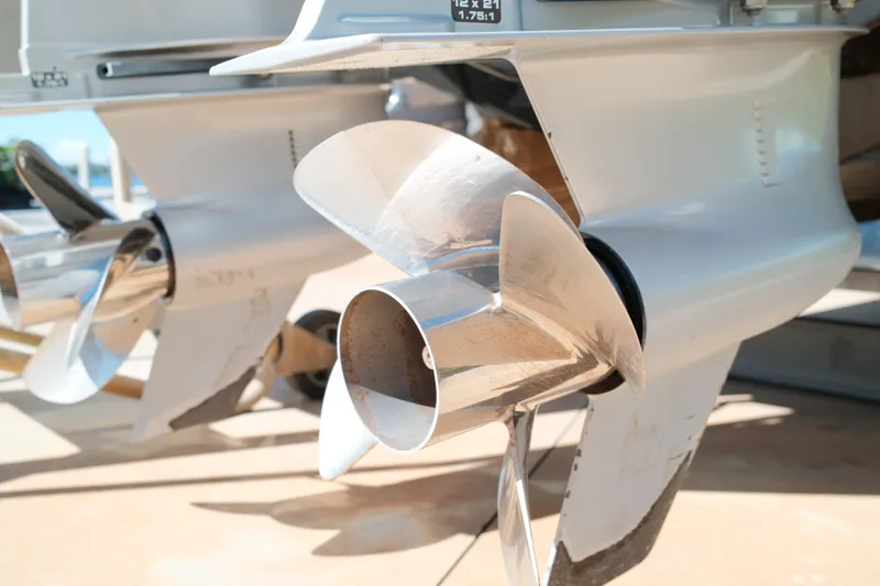 Slide: The Image of Close-up of 2021 Tidewater 292 CC Adventure boat propellers. - 20