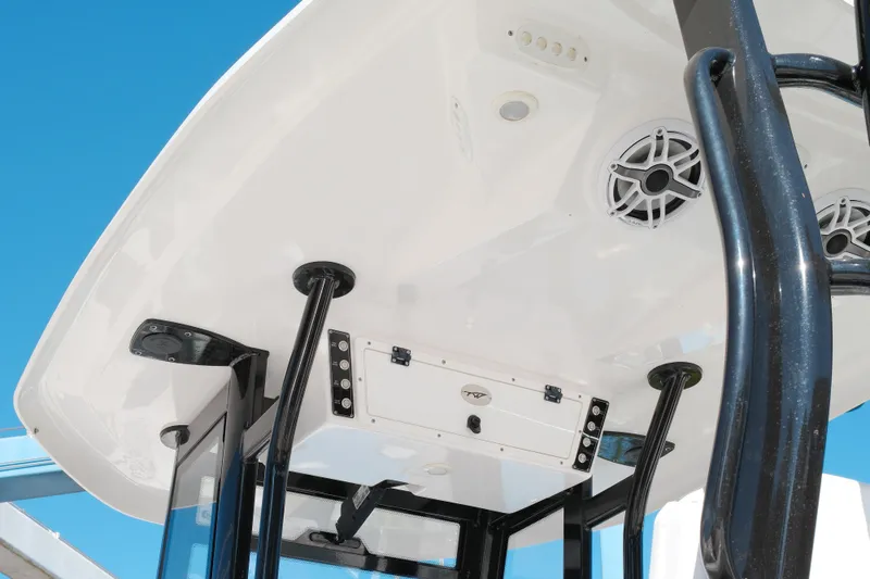 Slide: The Image of 2021 Tidewater 292 CC Adventure boat's underside view with speakers and support structure. - 3