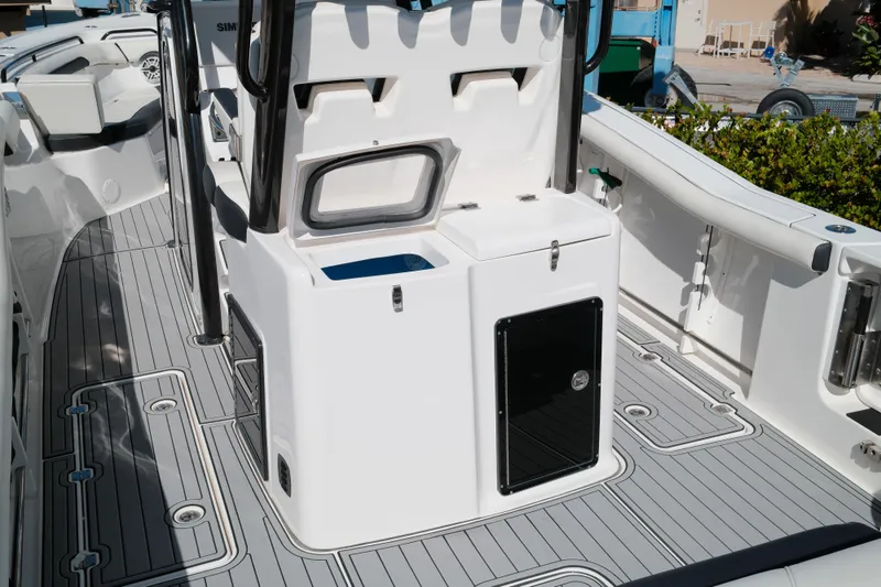 Slide: The Image of 2021 Tidewater 292 CC Adventure boat interior with sleek design and modern amenities. - 5
