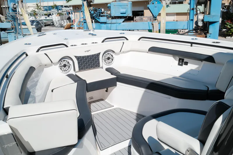 Slide: The Image of Interior of 2021 Tidewater 292 CC Adventure boat with sleek seating and modern design. - 9