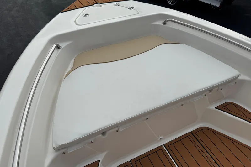 Slide: The Image of 2017 Key West 189 FS boat interior with cushioned seating and wood-style flooring. - 101